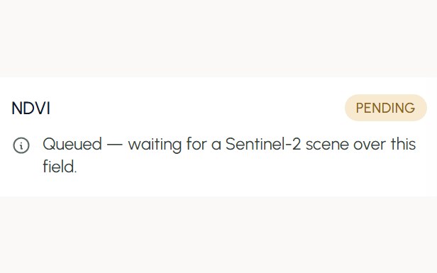 The NDVI card in its first honest state: pending, queued for a Sentinel-2 scene over the new field